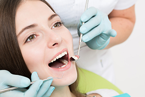 Woman Receiving a Dental Exam