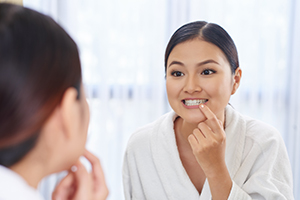 Woman Looking at Her Teeth