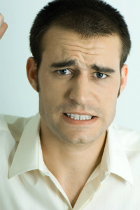 Man Grinding His Teeth